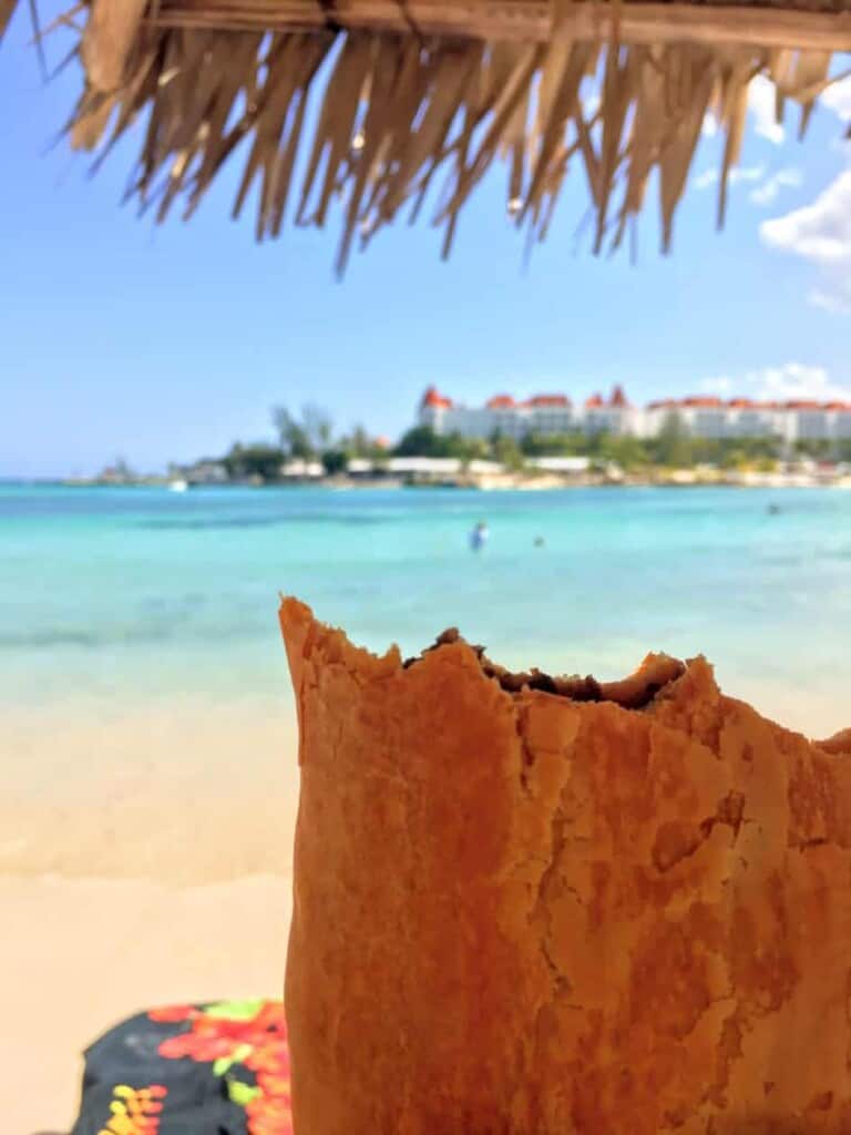 Eating beef patties on the beach in Jamaica.