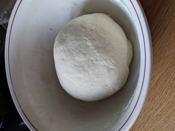 smooth hand kneaded ball of dough