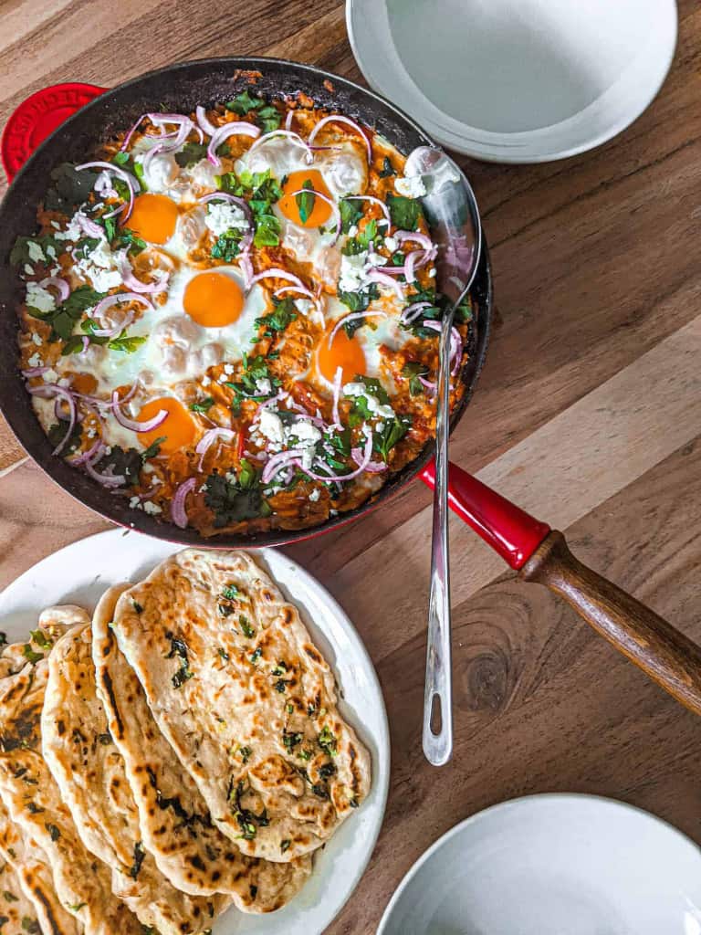 Sweet potato shakshula with garlic butter naan