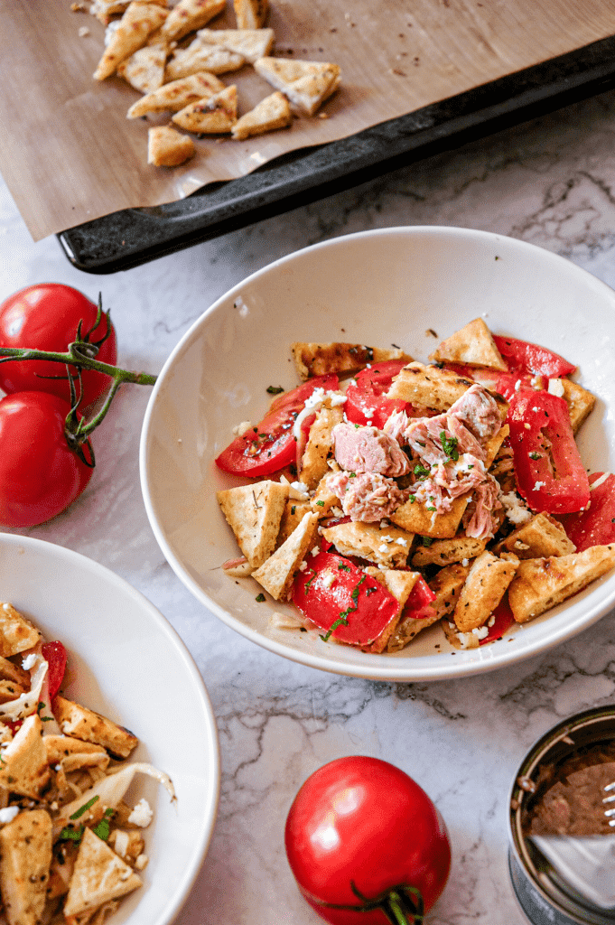 Shaved fennel salad with tomato, tuna and pita croutons