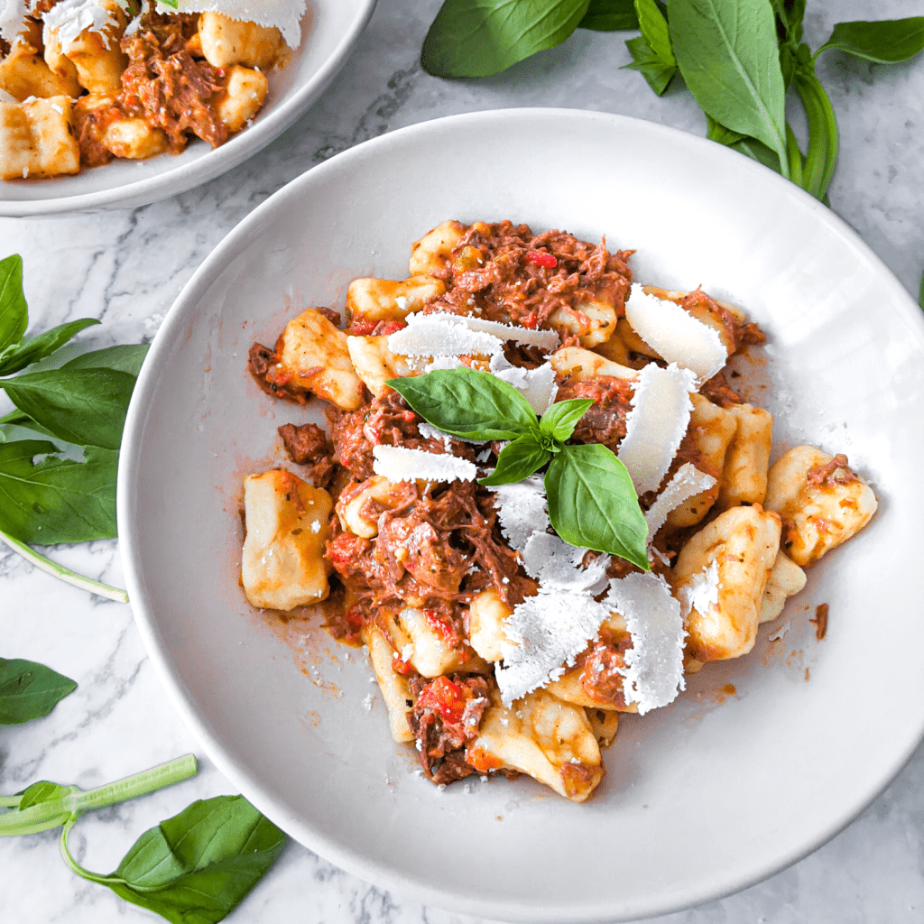 Homemade potato gnocchi with lamb ragu made from leftover roast lamb and mashed potatoes.