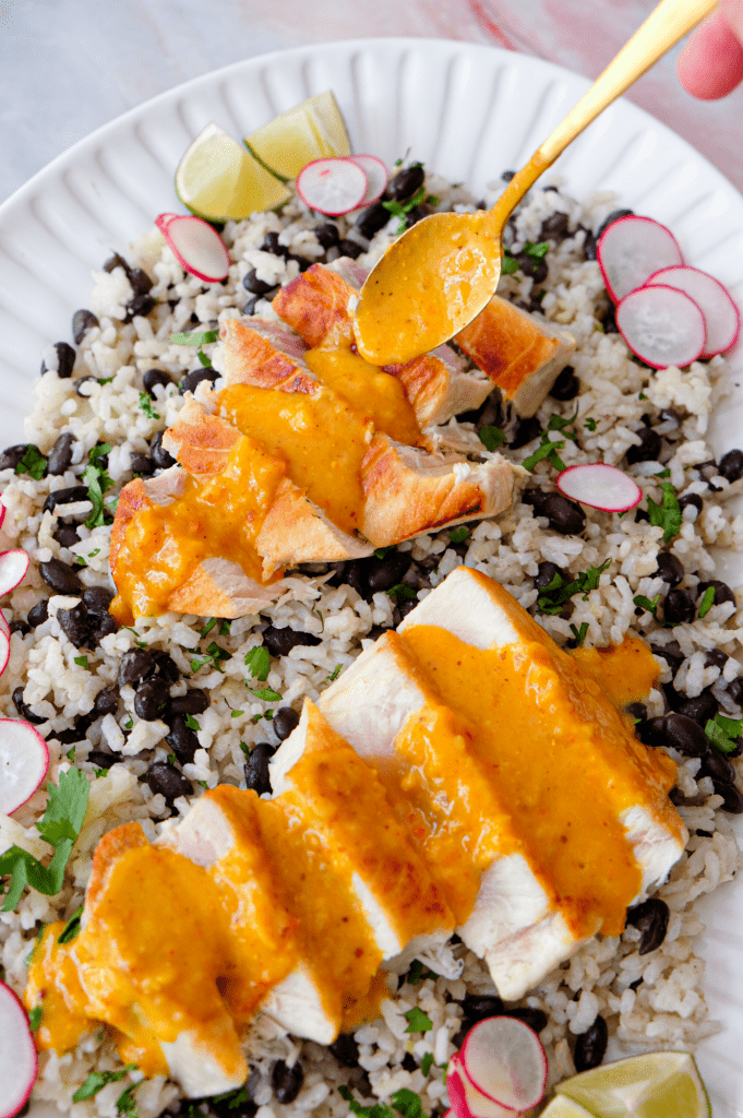 Seared tuna steaks with creamy coconut curry sauce and cilantro lime rice