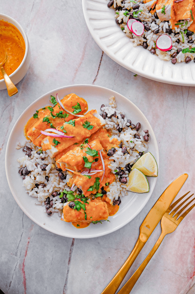 Seared tuna steaks with creamy coconut curry sauce and cilantro lime rice