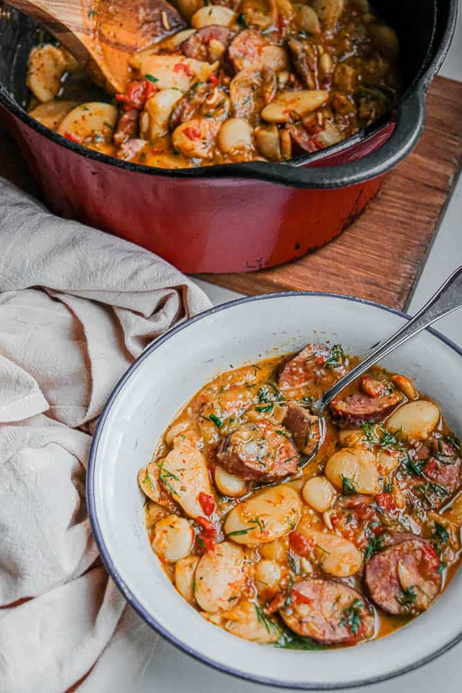 https://cristinaskitchen.com/wp-content/uploads/2020/11/Smoky-Romanian-Bean-and-Sausage-Stew-3547.jpg