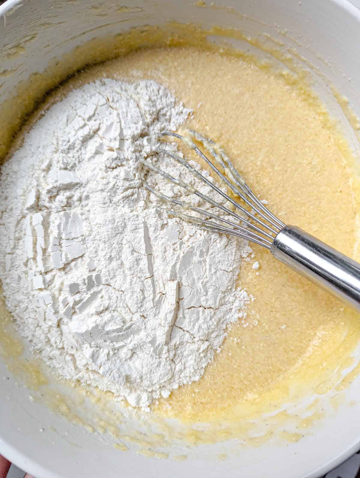 Dry ingredients added to wet to make cake batter.