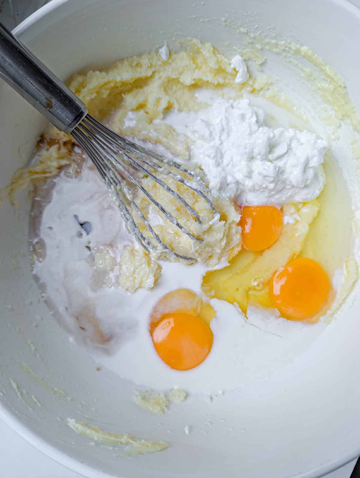 Milk, yogurt, vanilla and eggs added to just creamed butter and sugar.