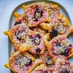 plate of cherry cheese danishes square
