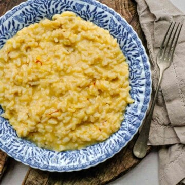 close up of risotto Milanese on a plate
