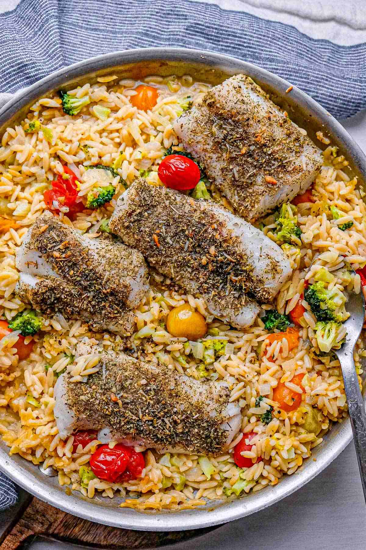 herb crusted cod over orzo