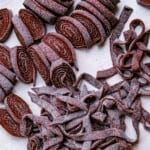 chocolate noodles being cut