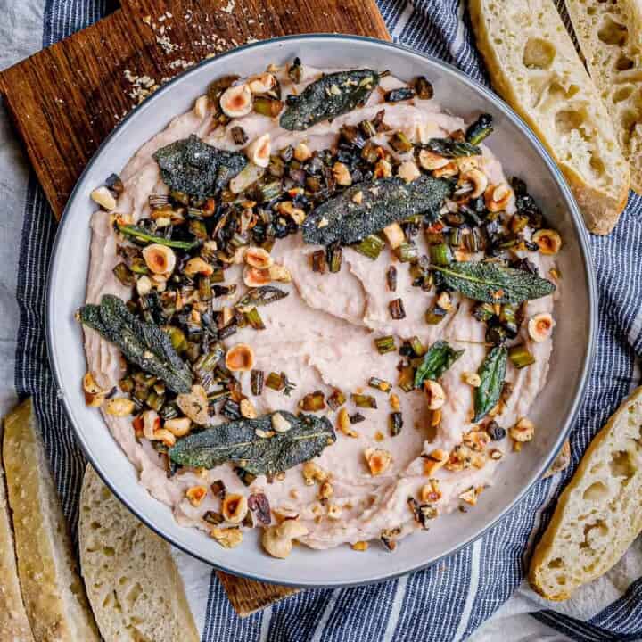Garlicky White Bean Dip with Kale Stems, Hazelnuts & Crispy Sage