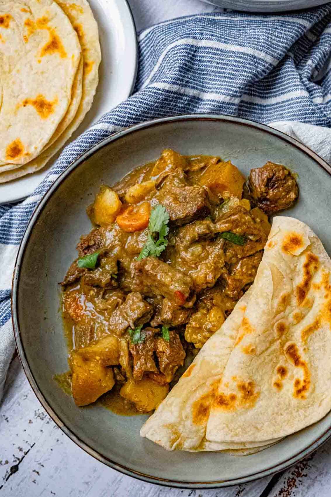 close up beef curry with roti