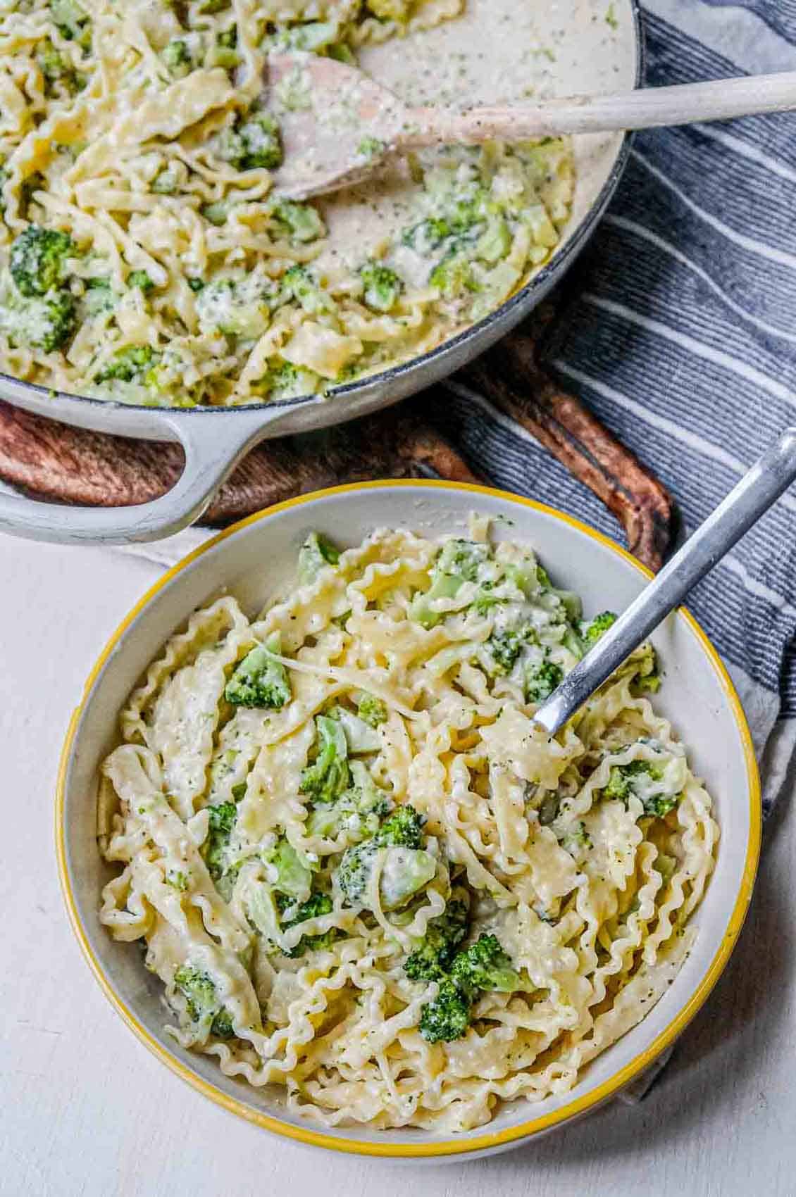 serving broccoli alfredo in bowl