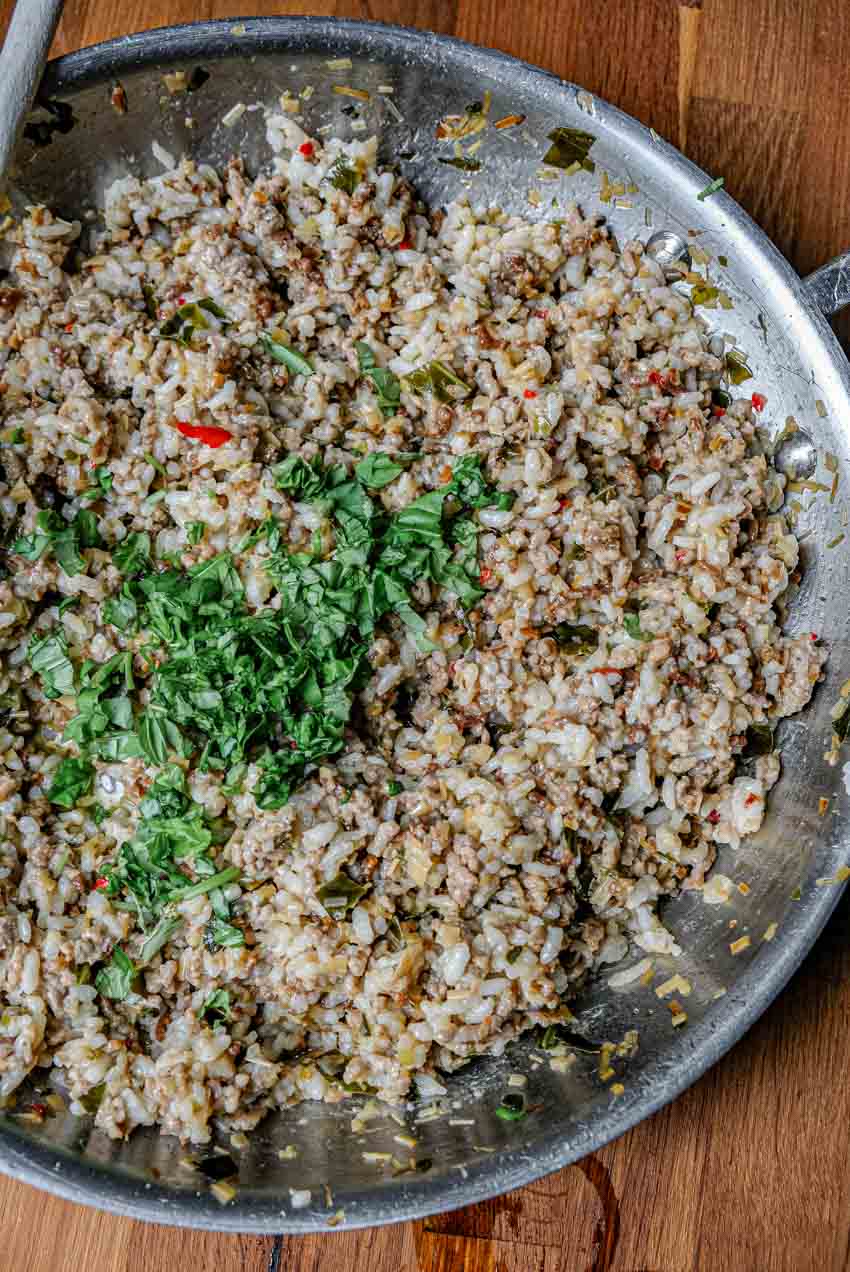 adding basil to filling