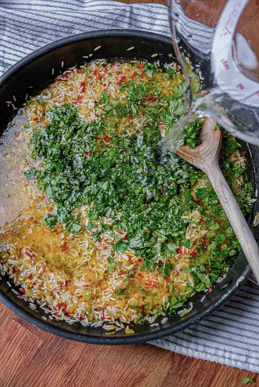 adding cilantro and water