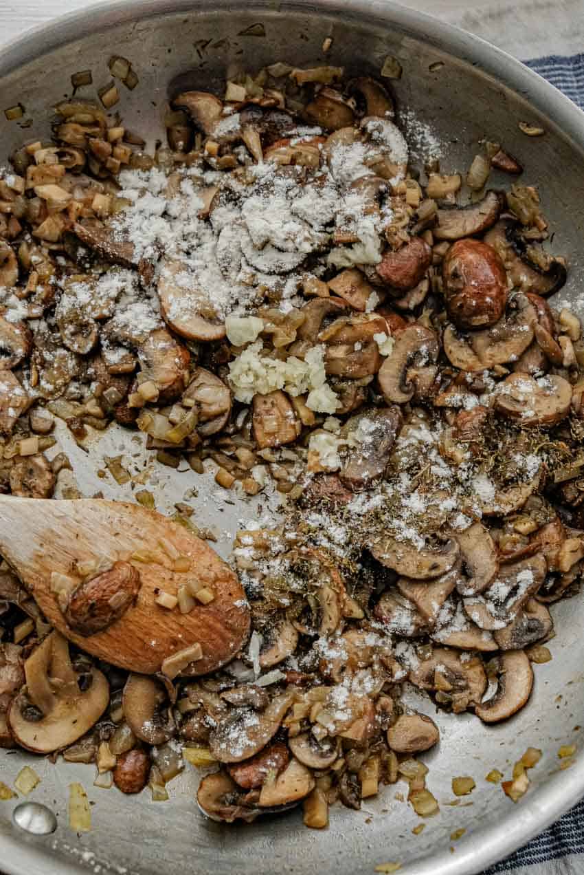 flour sprinkled into mushroom stew