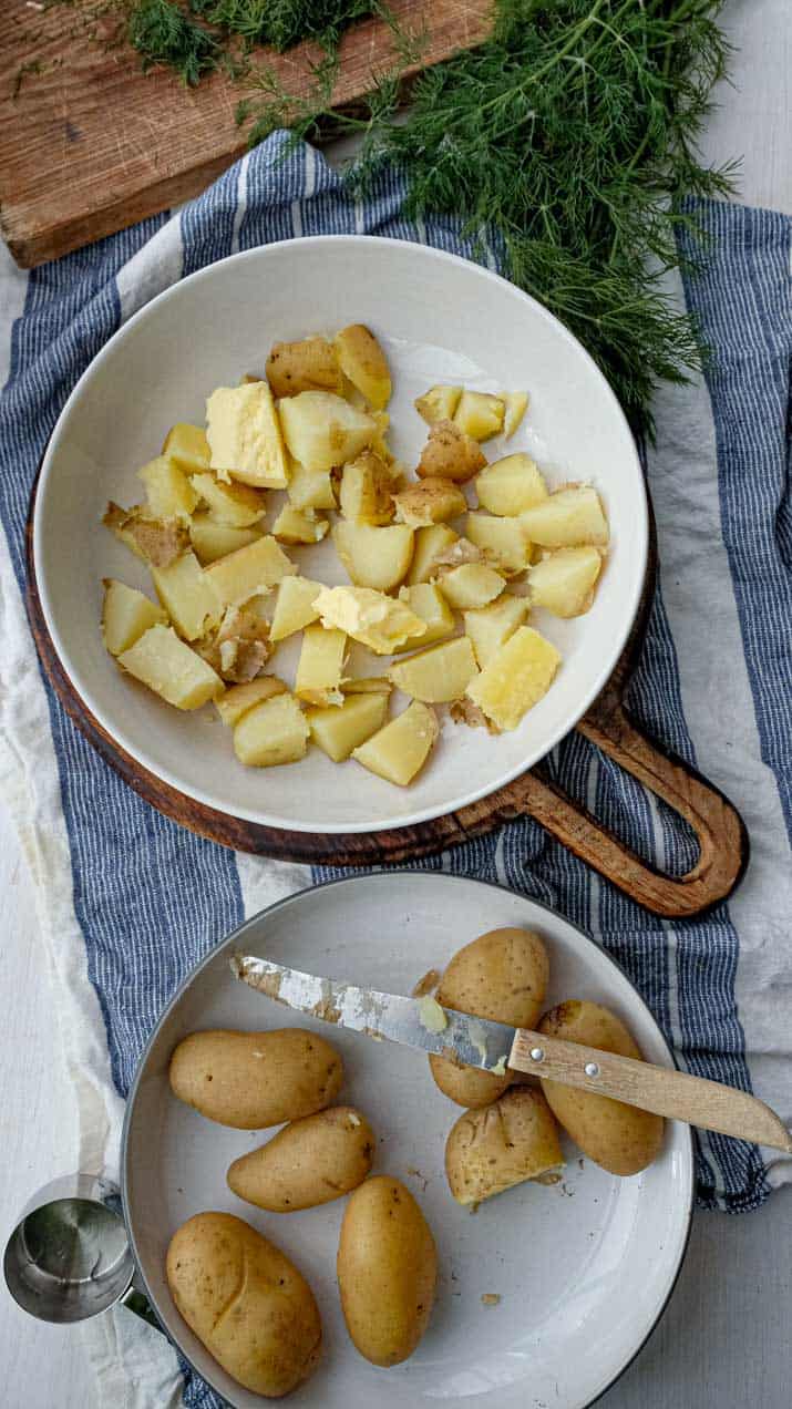 making dill butter boiled potatoes