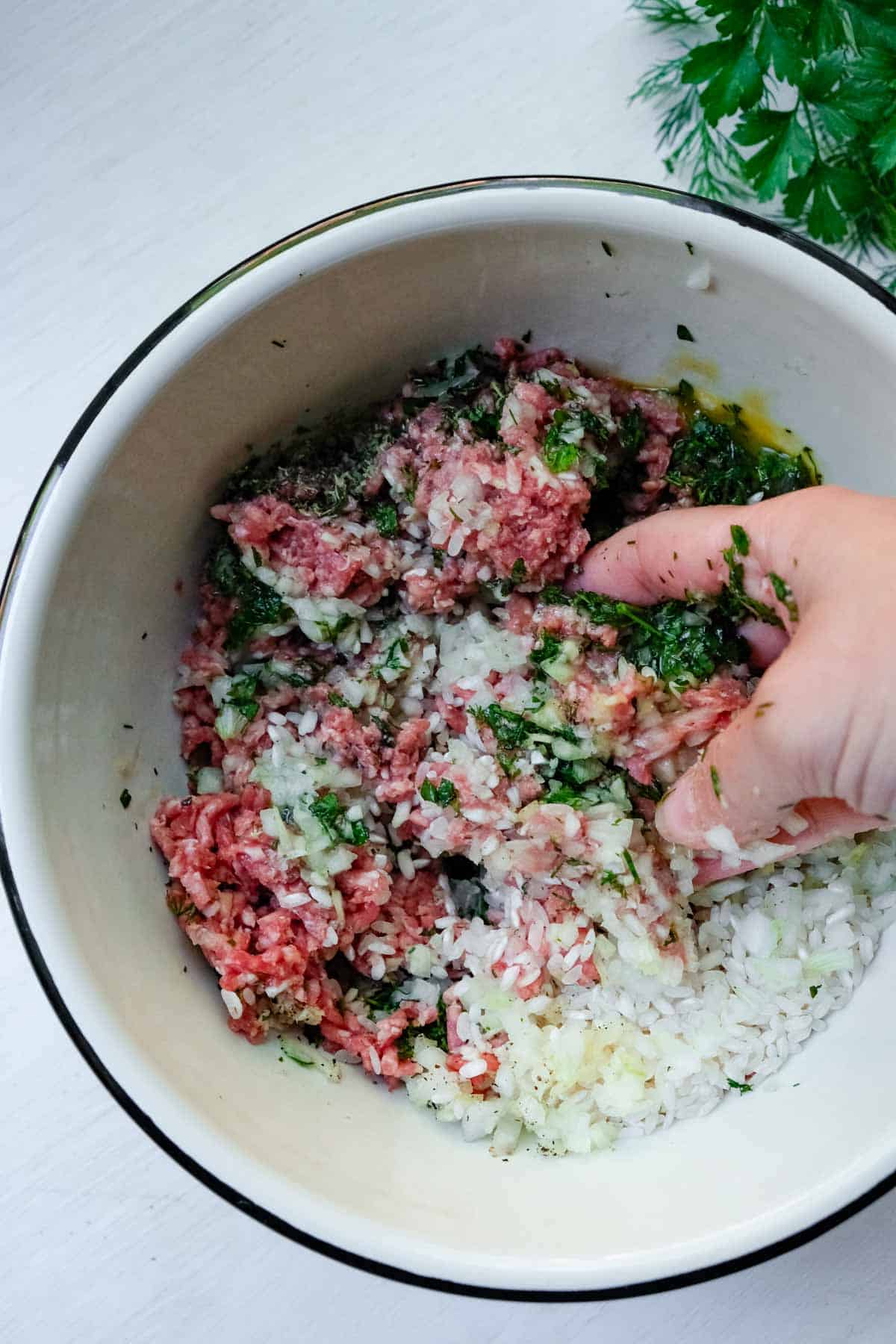 mixing rice meatballs