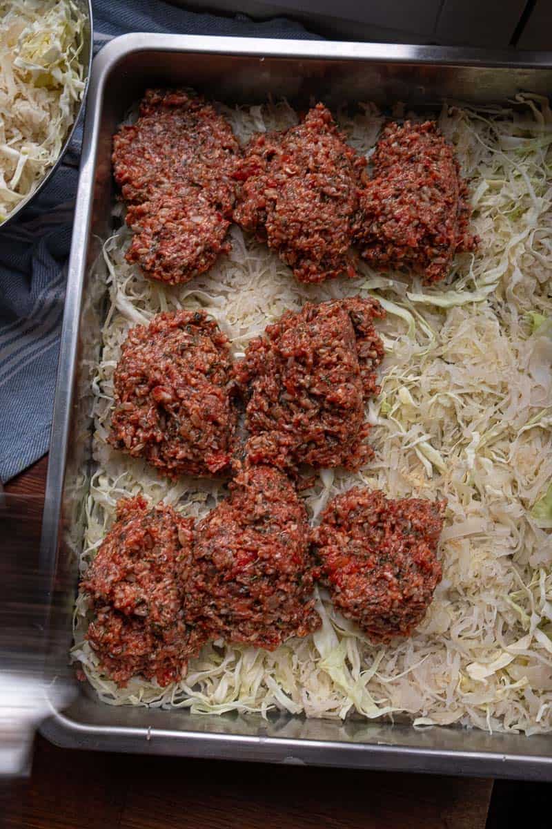 meat mix spooned onto cabbage