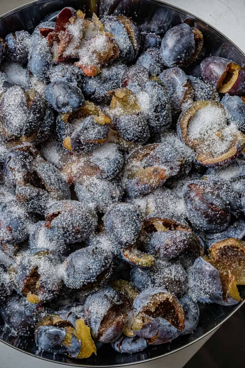 sugar over plums for plum butter