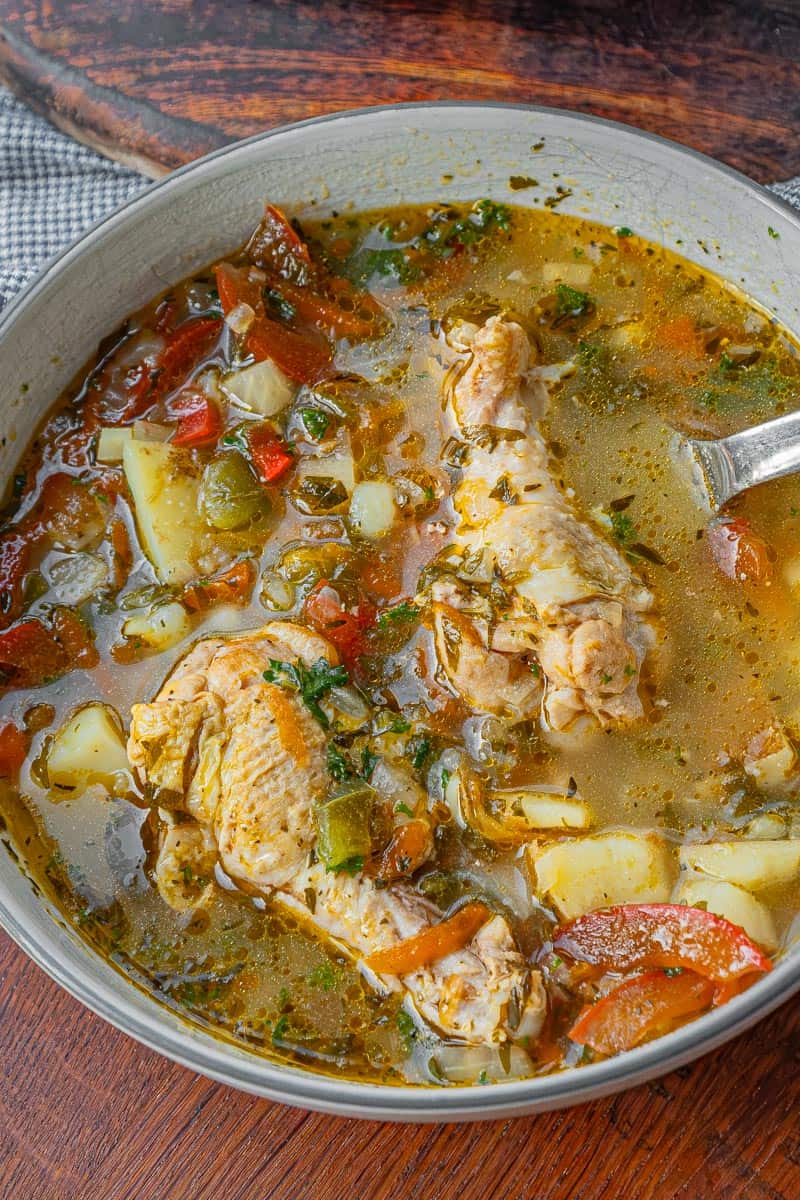 close up chicken and veg soup with potatoes