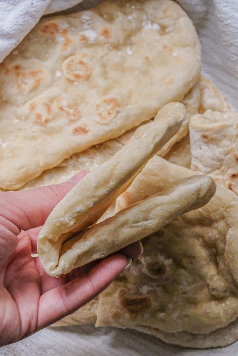 holding up pita burger bun