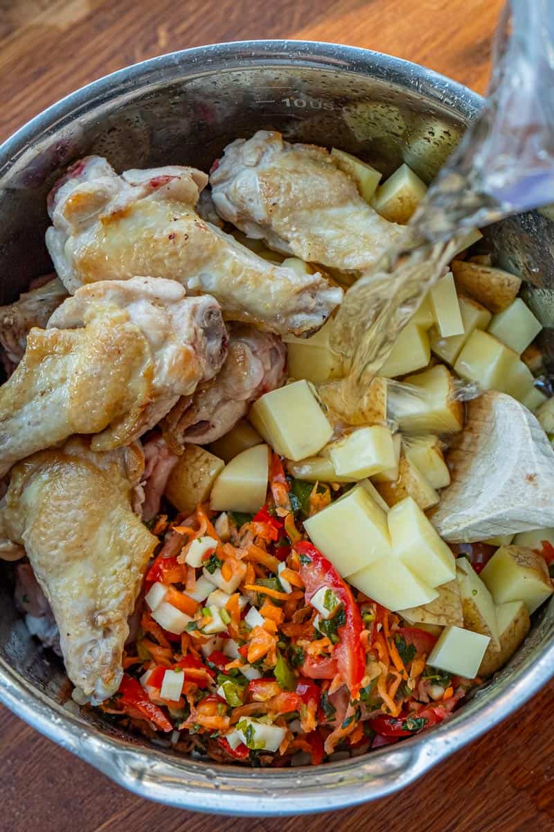 pouring water into soup mix