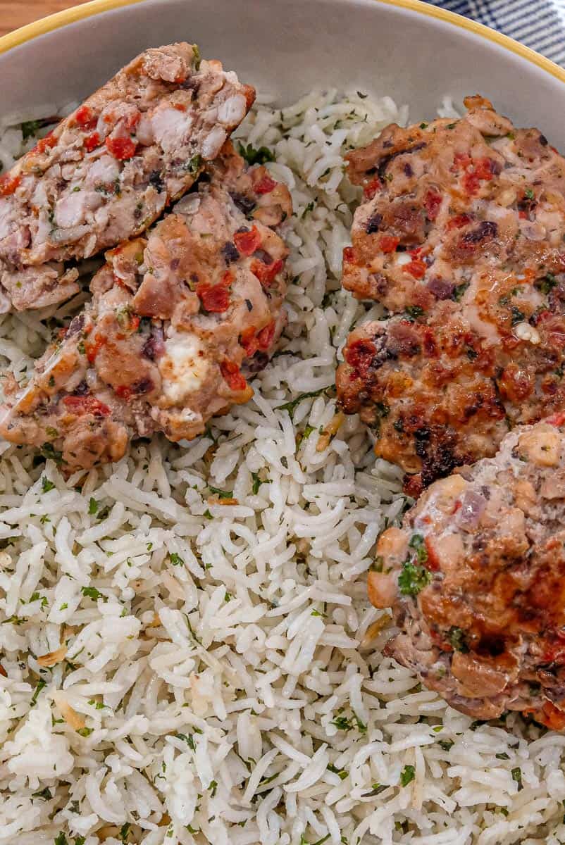red pepper feta chicken patties over simple rice