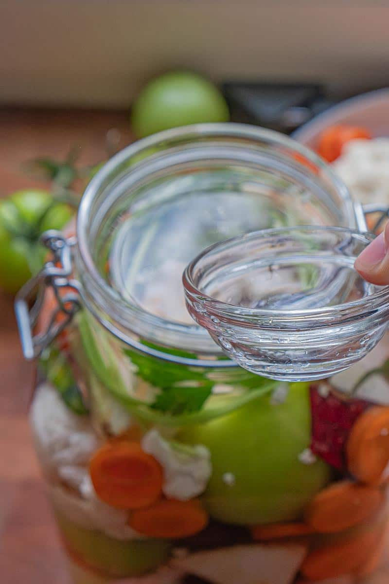 showing small bowl used as fermentation weight