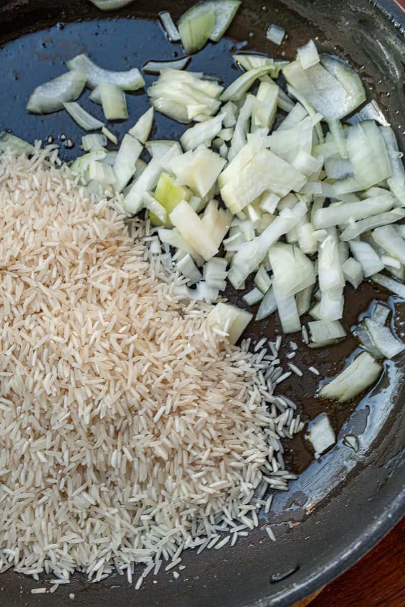 toasting onion and rice